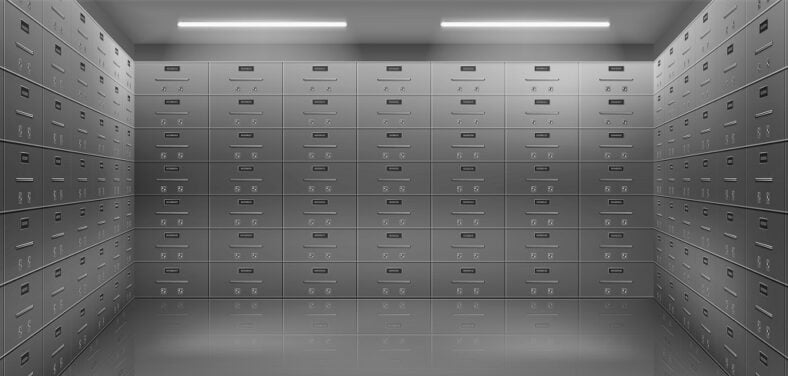 Rows of metal storage lockers inside a vault room